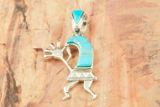 Genuine Sleeping Beauty Turquoise inlaid in Sterling Silver. Precision inlay on the bale and the pendant. Free 18